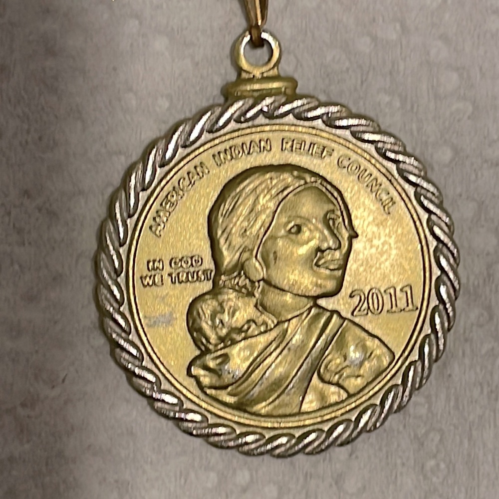 Real metal or silver I’m not sure coin knecklace
